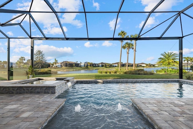 view of pool featuring an in ground hot tub, pool water feature, a water view, and a lanai