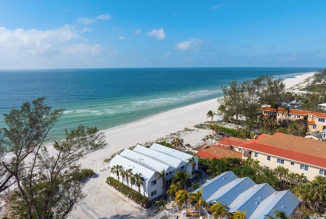 aerial view featuring a water view and a view of the beach