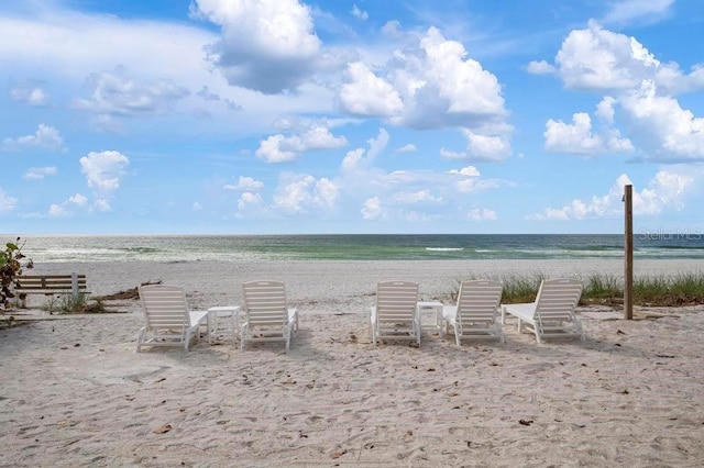 property view of water featuring a beach view