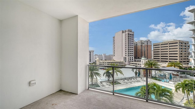 balcony featuring a city view