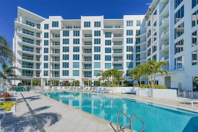 view of swimming pool with a patio