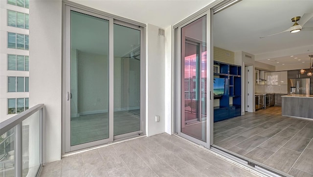 balcony with a ceiling fan