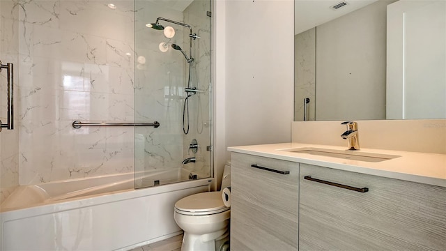 bathroom featuring toilet, visible vents, shower / bath combination, and vanity