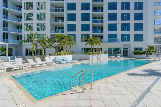 pool with a patio