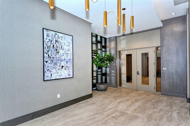 empty room featuring french doors and visible vents