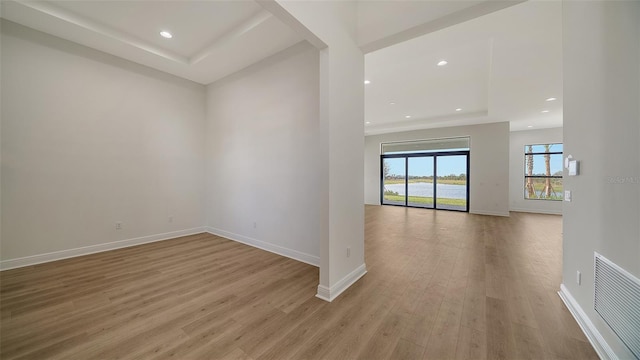 unfurnished living room featuring light wood-type flooring