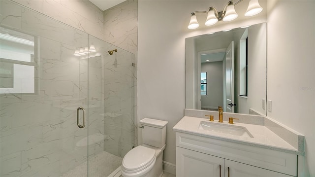 bathroom featuring toilet, a shower with door, and vanity