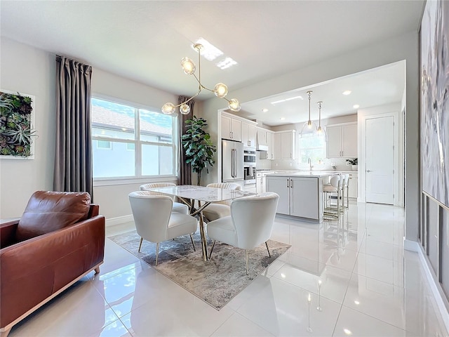 dining area featuring sink