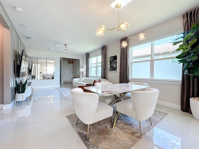 dining area featuring ceiling fan