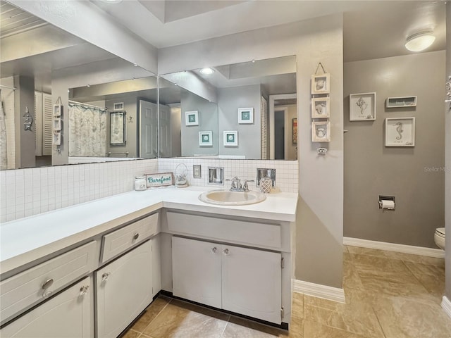 bathroom featuring tile patterned floors, toilet, decorative backsplash, vanity, and a shower with shower curtain