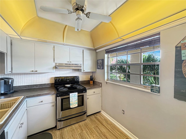 kitchen with stainless steel range with electric cooktop, light hardwood / wood-style flooring, ceiling fan, decorative backsplash, and white cabinetry