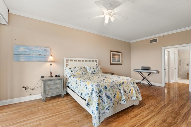 bedroom with ceiling fan, light hardwood / wood-style floors, ensuite bathroom, and ornamental molding