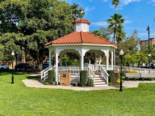 surrounding community featuring a lawn and a gazebo