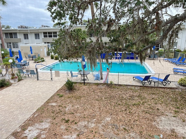 view of swimming pool featuring a patio area