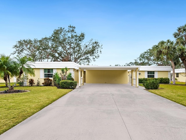 single story home with a front lawn