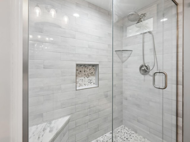 bathroom featuring an enclosed shower