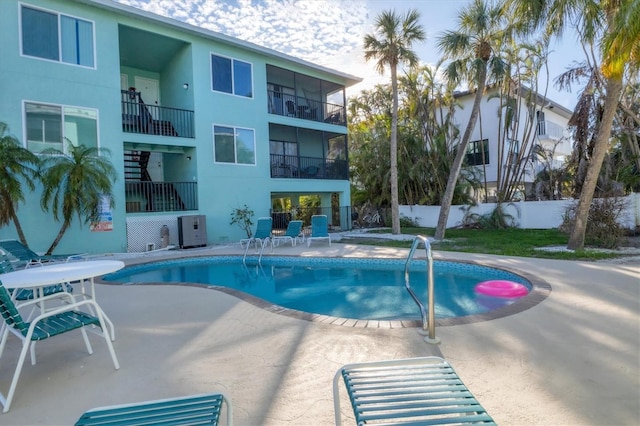 view of pool featuring a patio area