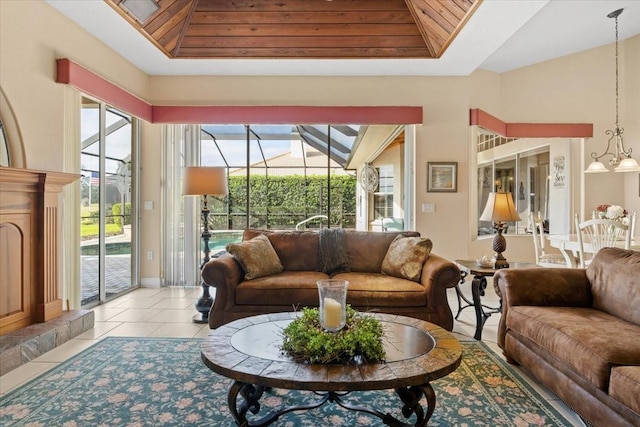 tiled living room featuring a raised ceiling and wood ceiling