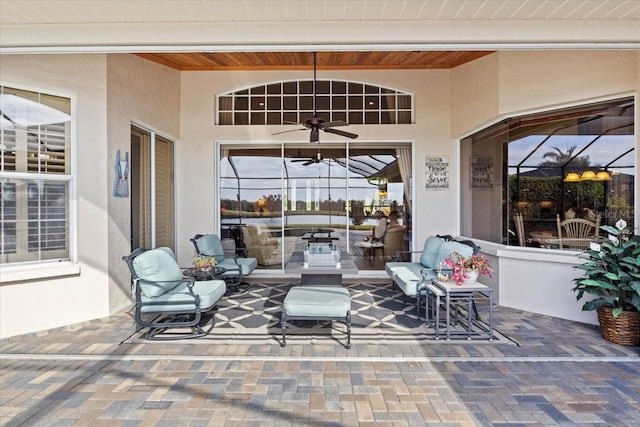 view of patio featuring ceiling fan