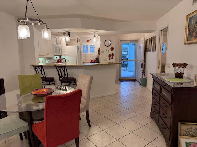 view of tiled dining space