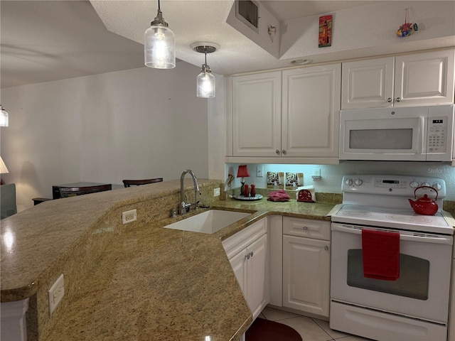 kitchen featuring decorative light fixtures, kitchen peninsula, sink, white appliances, and white cabinetry