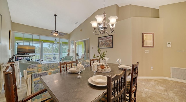 dining room featuring ceiling fan with notable chandelier and high vaulted ceiling