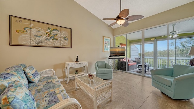 tiled living room with vaulted ceiling and ceiling fan