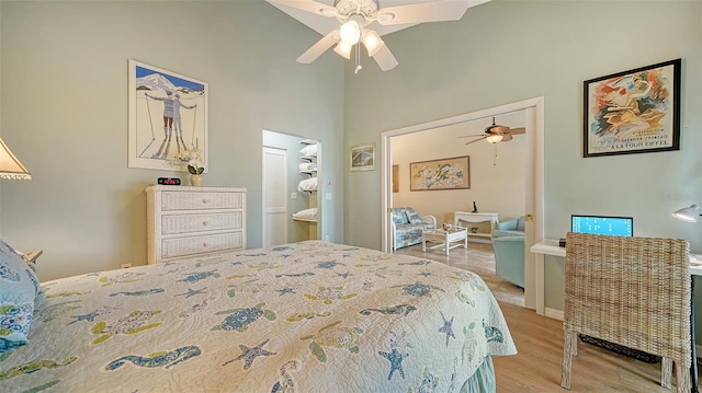 bedroom with hardwood / wood-style flooring and ceiling fan