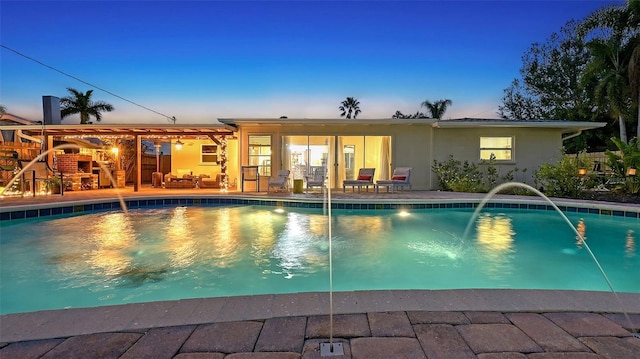 pool featuring a patio area