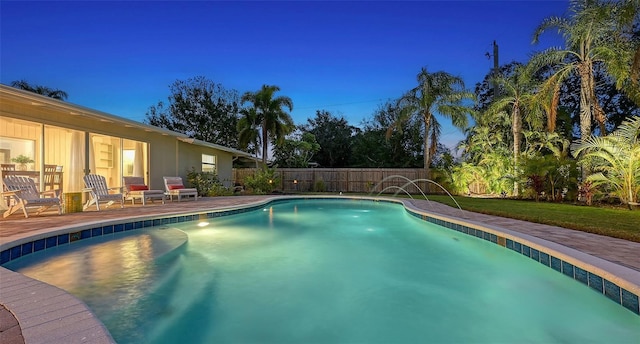 view of swimming pool featuring a fenced in pool, fence, and a patio