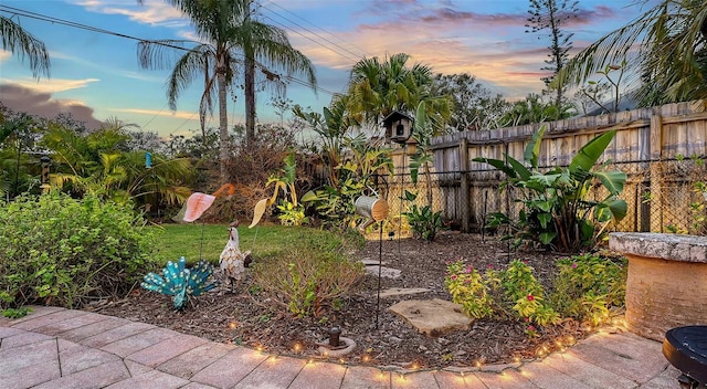 yard at dusk with fence