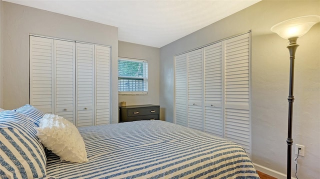 bedroom featuring two closets