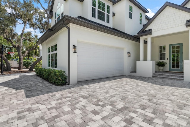 view of side of home with a garage