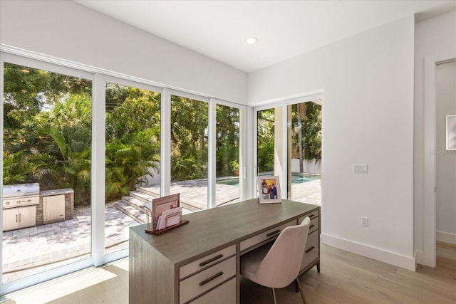 home office featuring light wood-type flooring