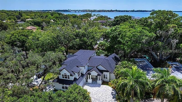 birds eye view of property featuring a water view