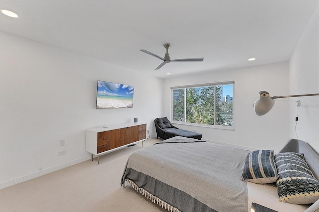 bedroom with ceiling fan and carpet flooring