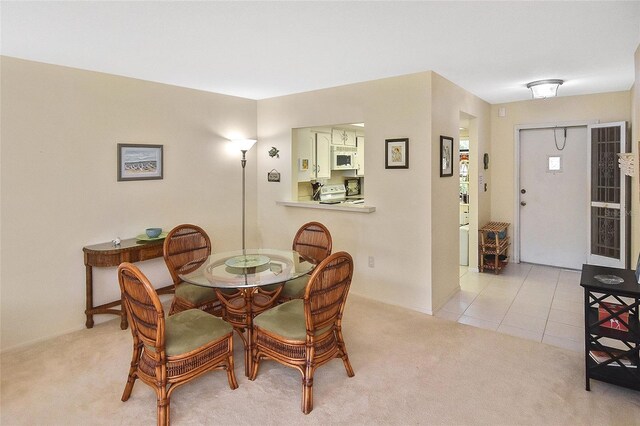 view of carpeted dining room