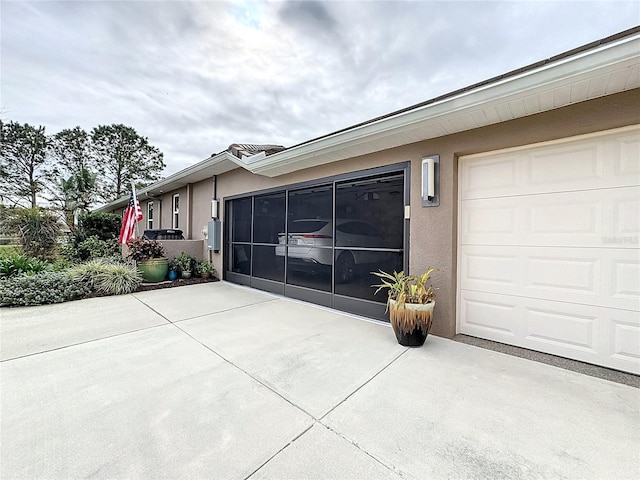 view of property exterior featuring a garage