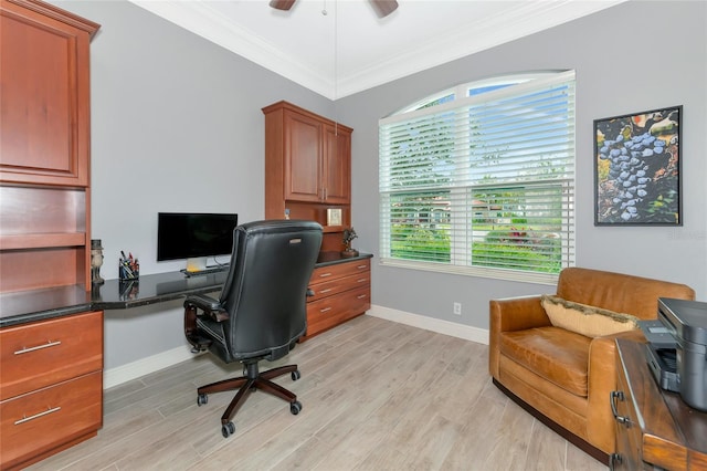 office featuring ornamental molding, ceiling fan, and light hardwood / wood-style flooring