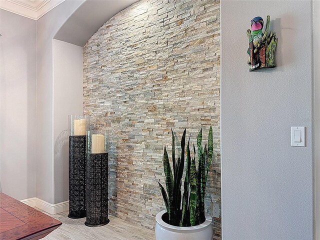 interior details with arched walkways and baseboards