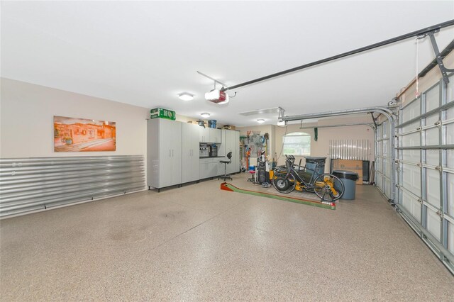 garage featuring a garage door opener