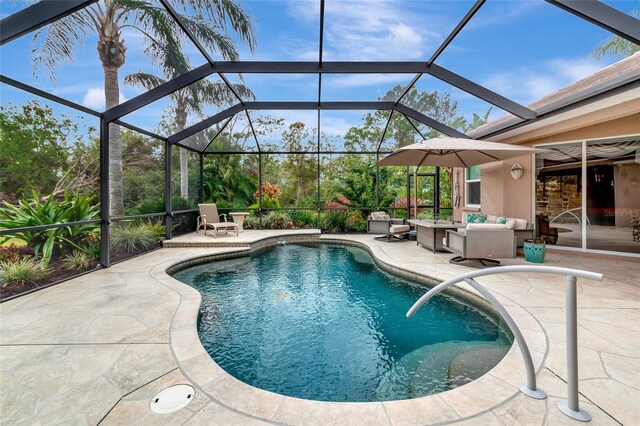 outdoor pool with a patio, an outdoor living space, and glass enclosure