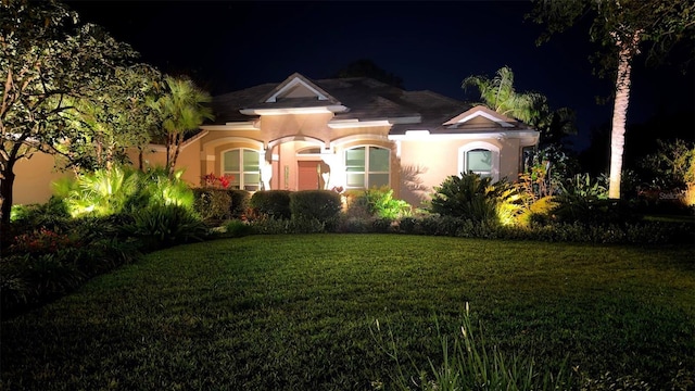 16806 5th Ter NE, Bradenton, FL 34212 - mediterranean / spanish-style house with a lawn and stucco siding