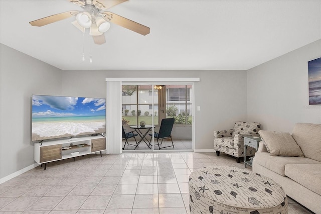 living room featuring light tile patterned flooring and ceiling fan