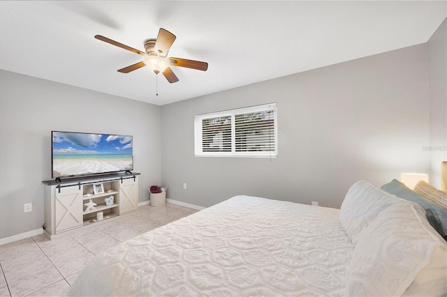 tiled bedroom with ceiling fan