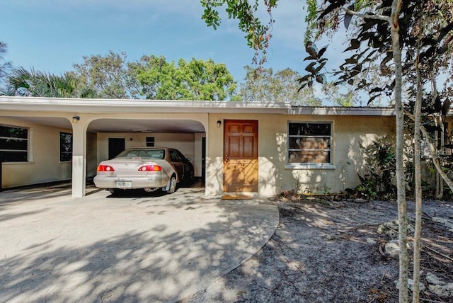 view of front of house with a carport