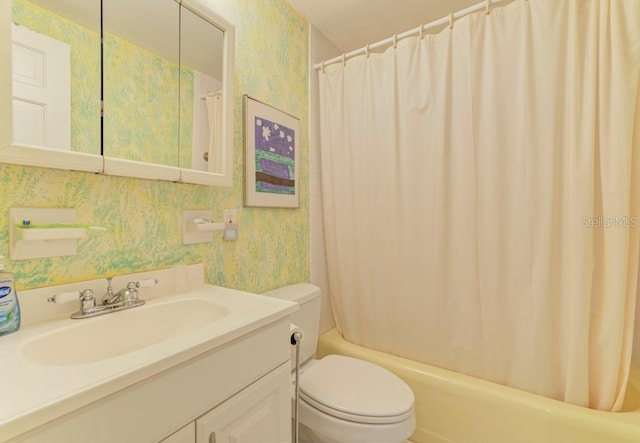 full bathroom with vanity, toilet, and shower / bathtub combination with curtain