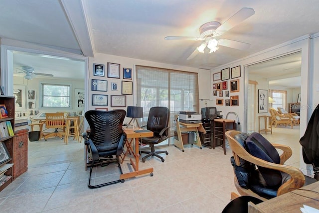 tiled office space with a wealth of natural light and ceiling fan