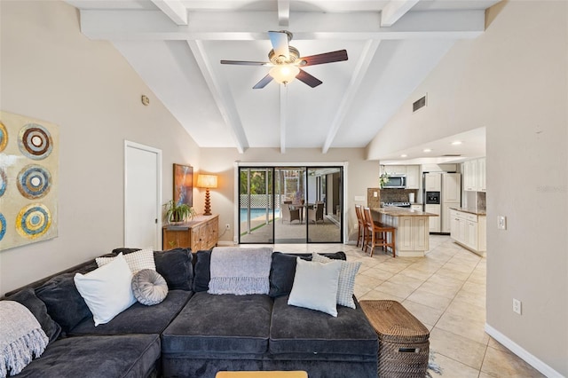 living room featuring light tile patterned floors, beamed ceiling, high vaulted ceiling, and ceiling fan