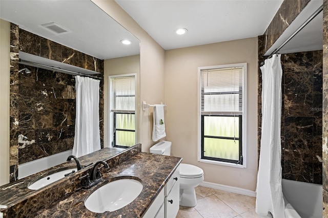 full bathroom featuring vanity, tile patterned flooring, shower / bath combination with curtain, and toilet